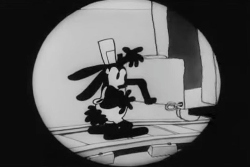 A black and white cartoon of Oswald the Lucky Rabbit trying to start a trolley